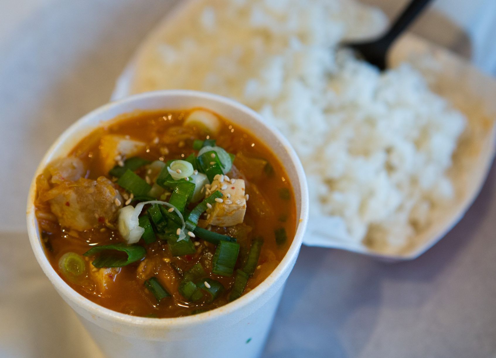 Spicy kimchi soup with a side of rice from Seoul Taco.